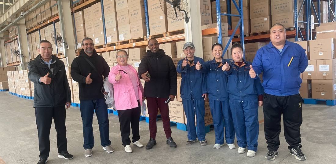 Overseas buyers visiting the finished-goods warehouse
