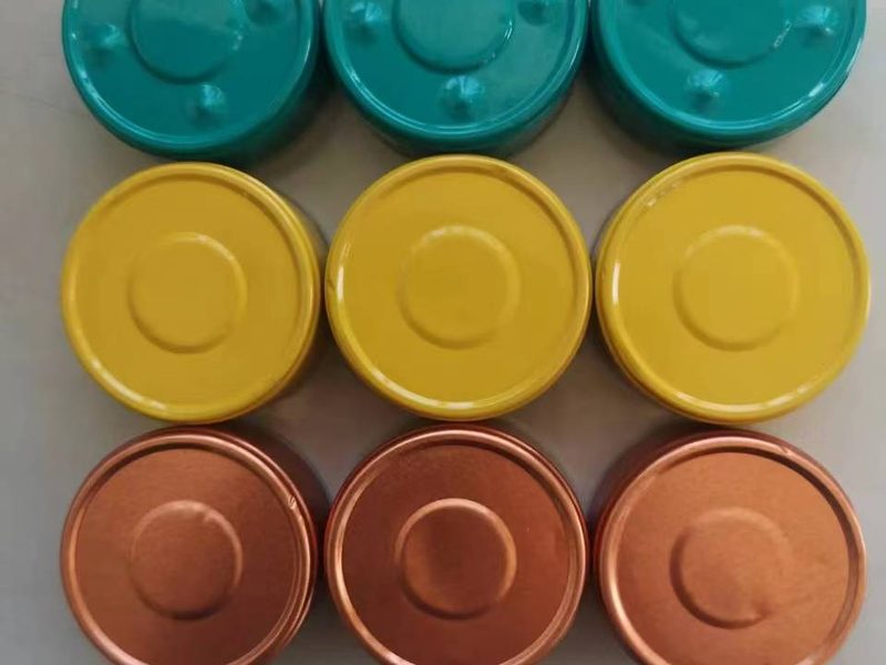 Colored smoothwall aluminum containers with lids in teal, yellow and copper